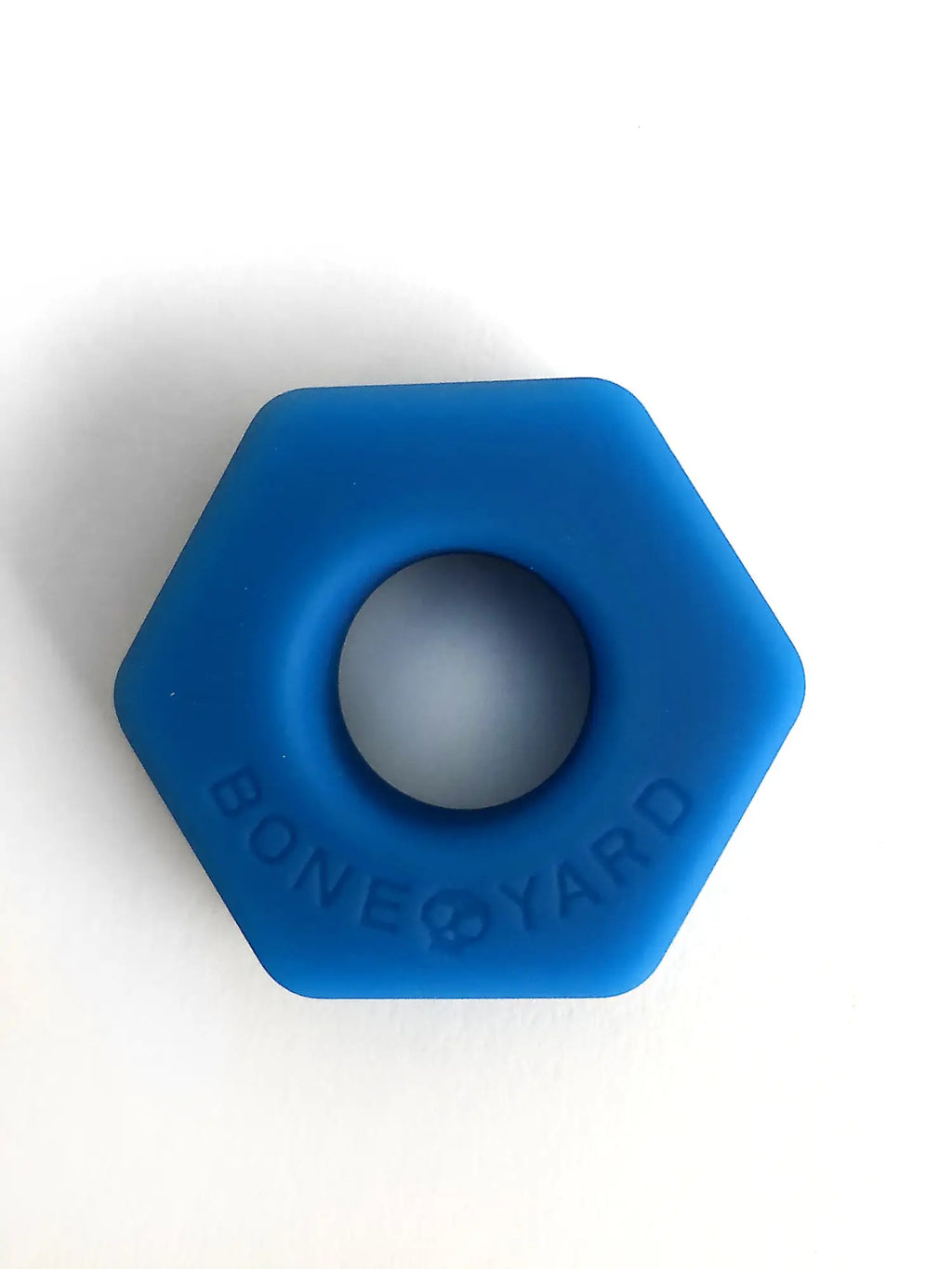 Blue hexagonal silicone ring titled bust a nut with bone yard engraved on its side