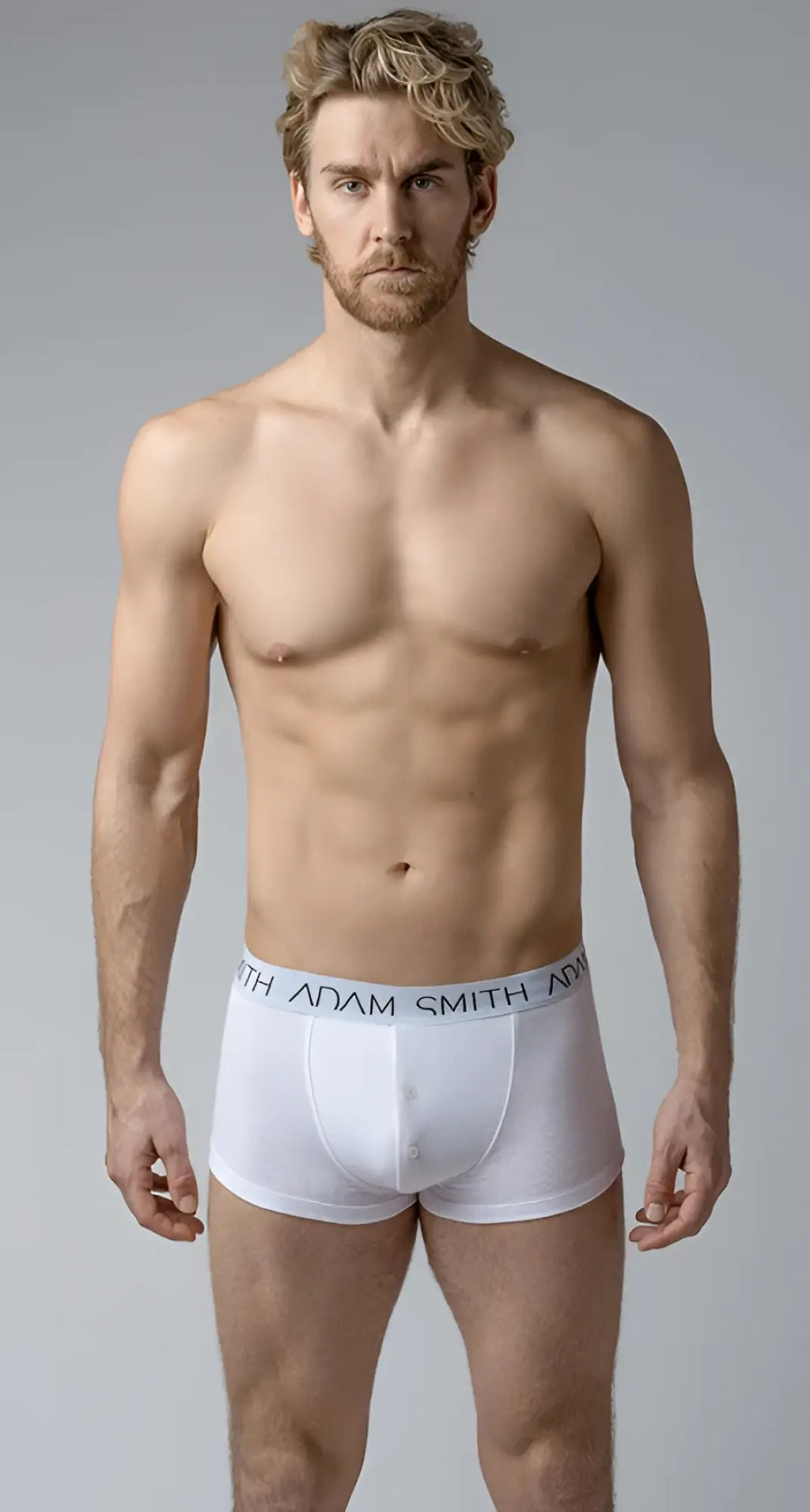 White adam smith boxer briefs button front trunks with light gray elastic waistband and black brand lettering