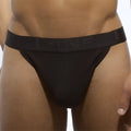 Black c-in2 core thong underwear size s with snug fit and elastic waistband featuring linc branding