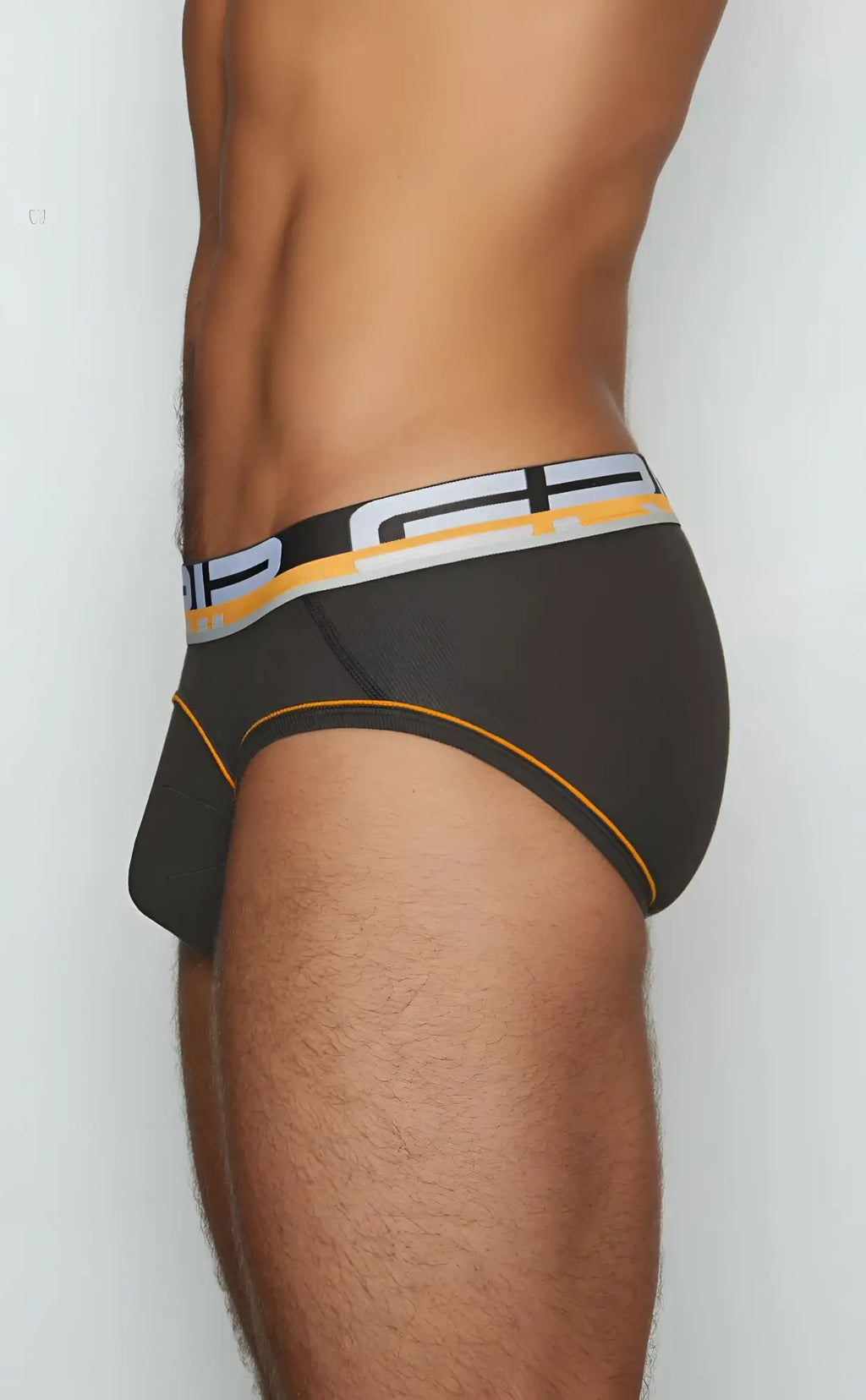 Black c-in2 brief 3313-068 with bold white yellow striped waistband p logo and orange stitching on leg openings