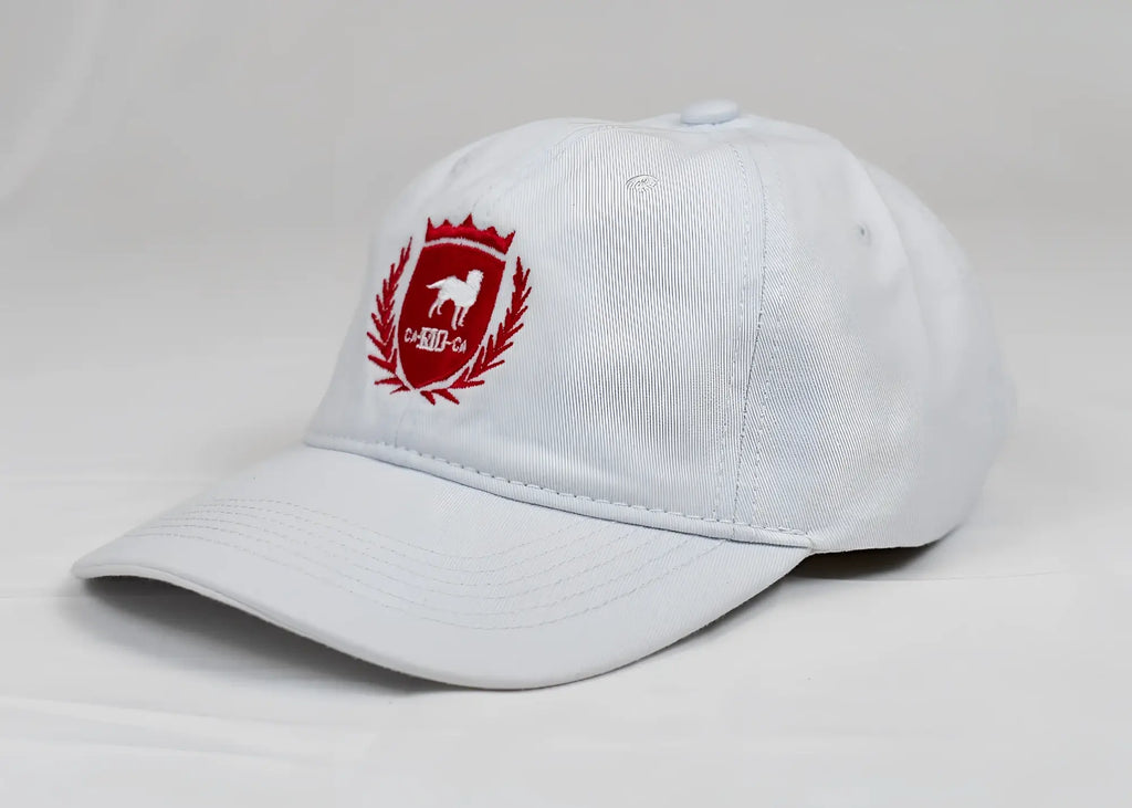 White CA-RIO-CA designer dad hat with red embroidered dog crest and laurel wreath men’s baseball cap