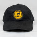 Black cotton ca-rio-ca crest logo embroidered dad hat with yellow shield, black dog silhouette, and laurel wreath design