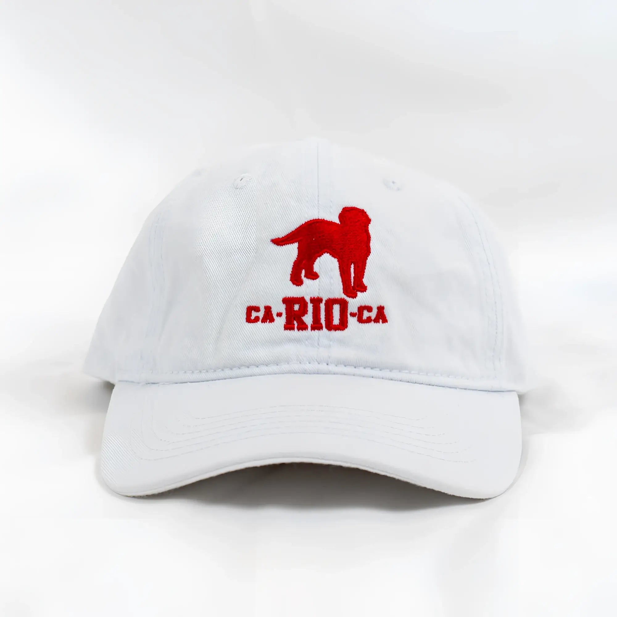 White baseball cap with red embroidered ca-rio-ca dog silhouette logo designer dad hat for men in multiple colors