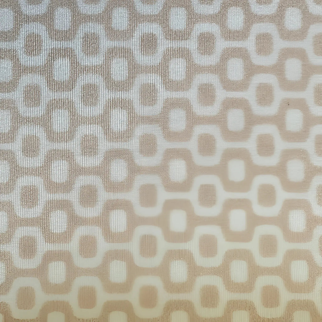Beige and cream geometric patterned fabric with interlocking oval shapes on ca-rio-ca logo swim men’s sunga beachwear