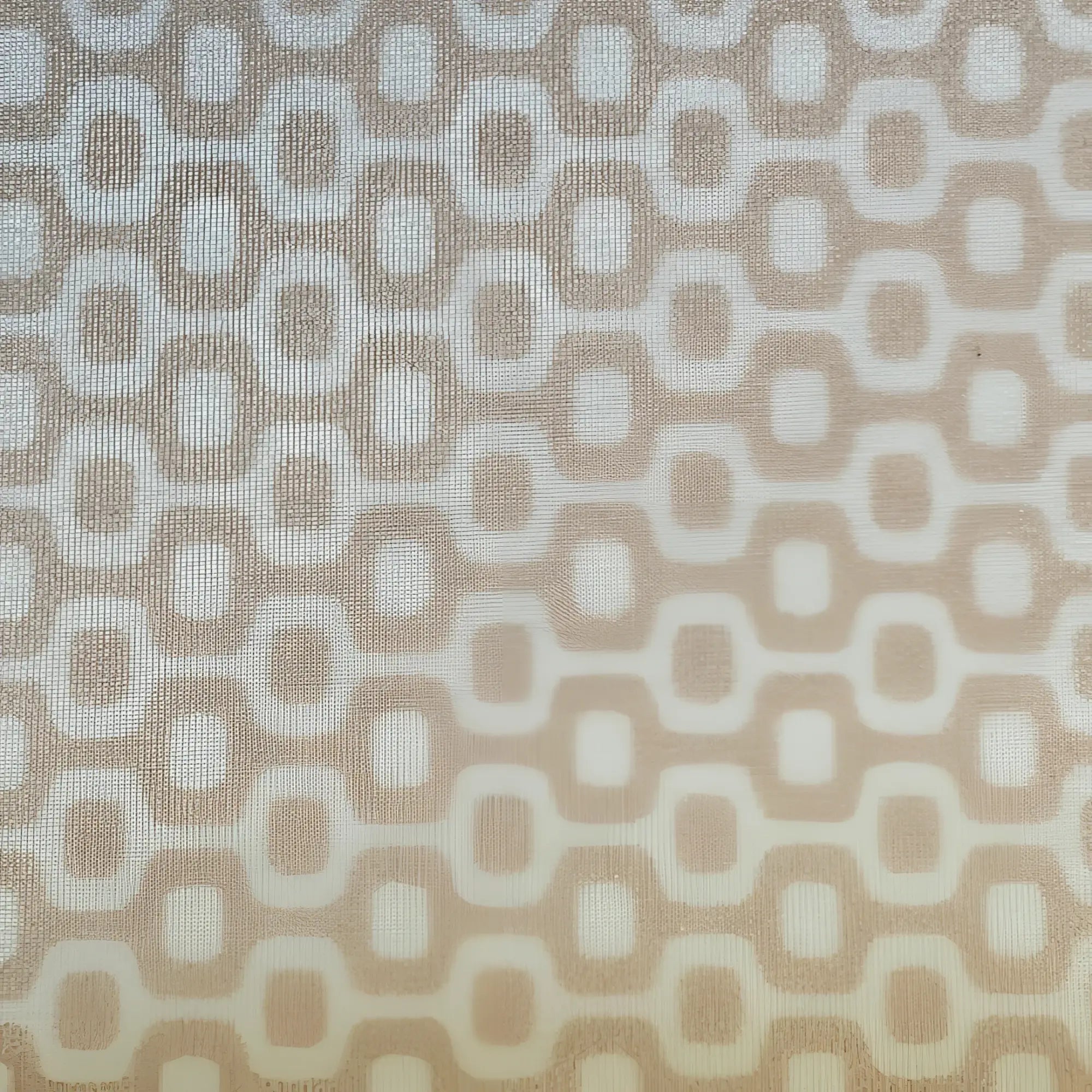Beige and cream geometric patterned fabric with interlocking oval shapes on ca-rio-ca logo swim men’s sunga beachwear