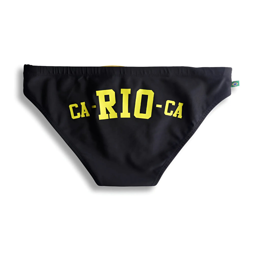 Black men’s swim trunks with bold yellow ca-rio-ca logo across the front for beachwear and swimming