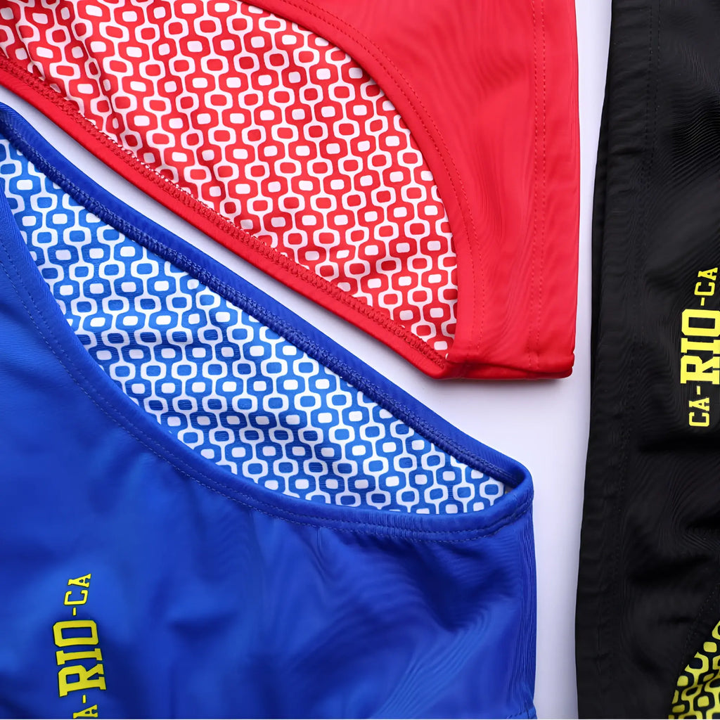 Men’s CA-RIO-CA logo swim bikini with red blue black briefs and white geometric pattern inner lining for beachwear