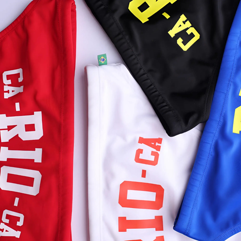 Men’s ca-rio-ca logo swim bikini red white and blue athletic shorts with bold rio-ca lettering for beachwear
