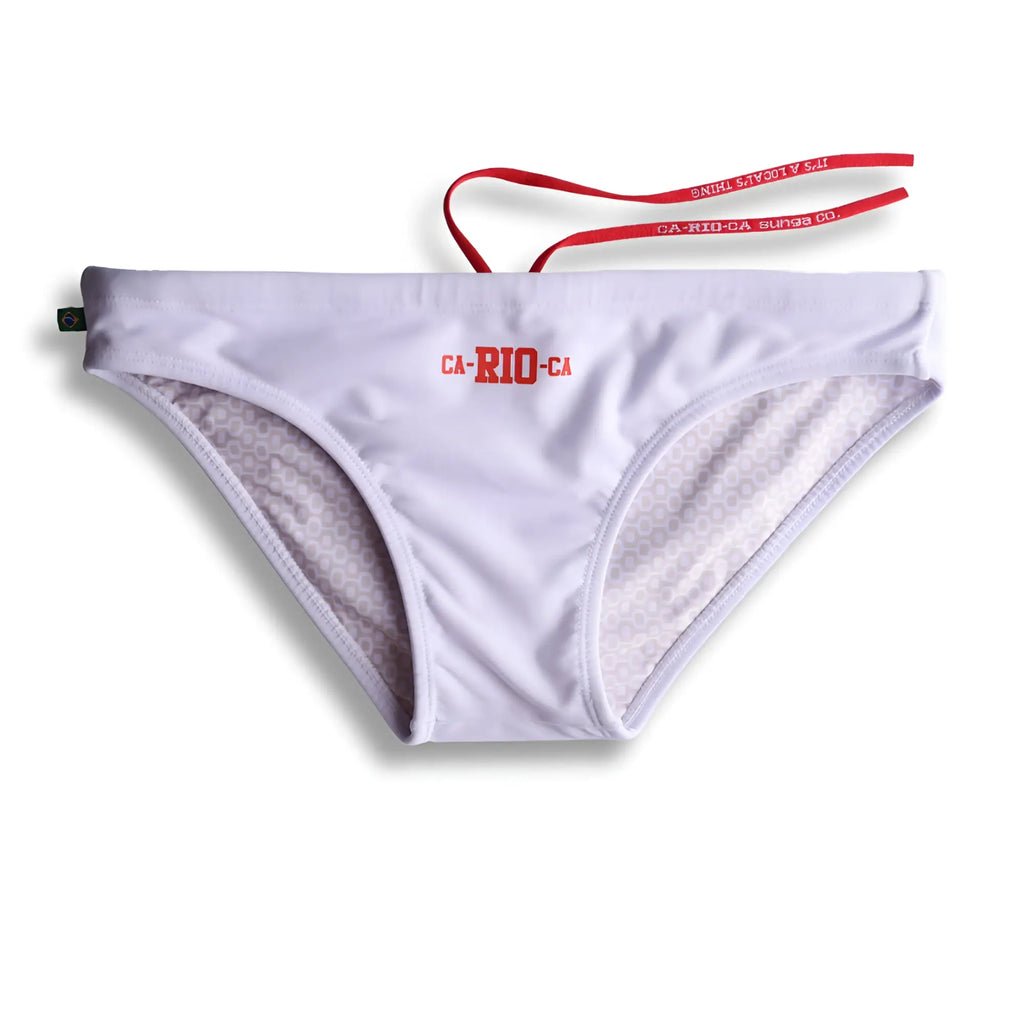White bikini bottom with red ca-rio-ca logo lettering and matching red drawstring for men’s swimwear beachwear