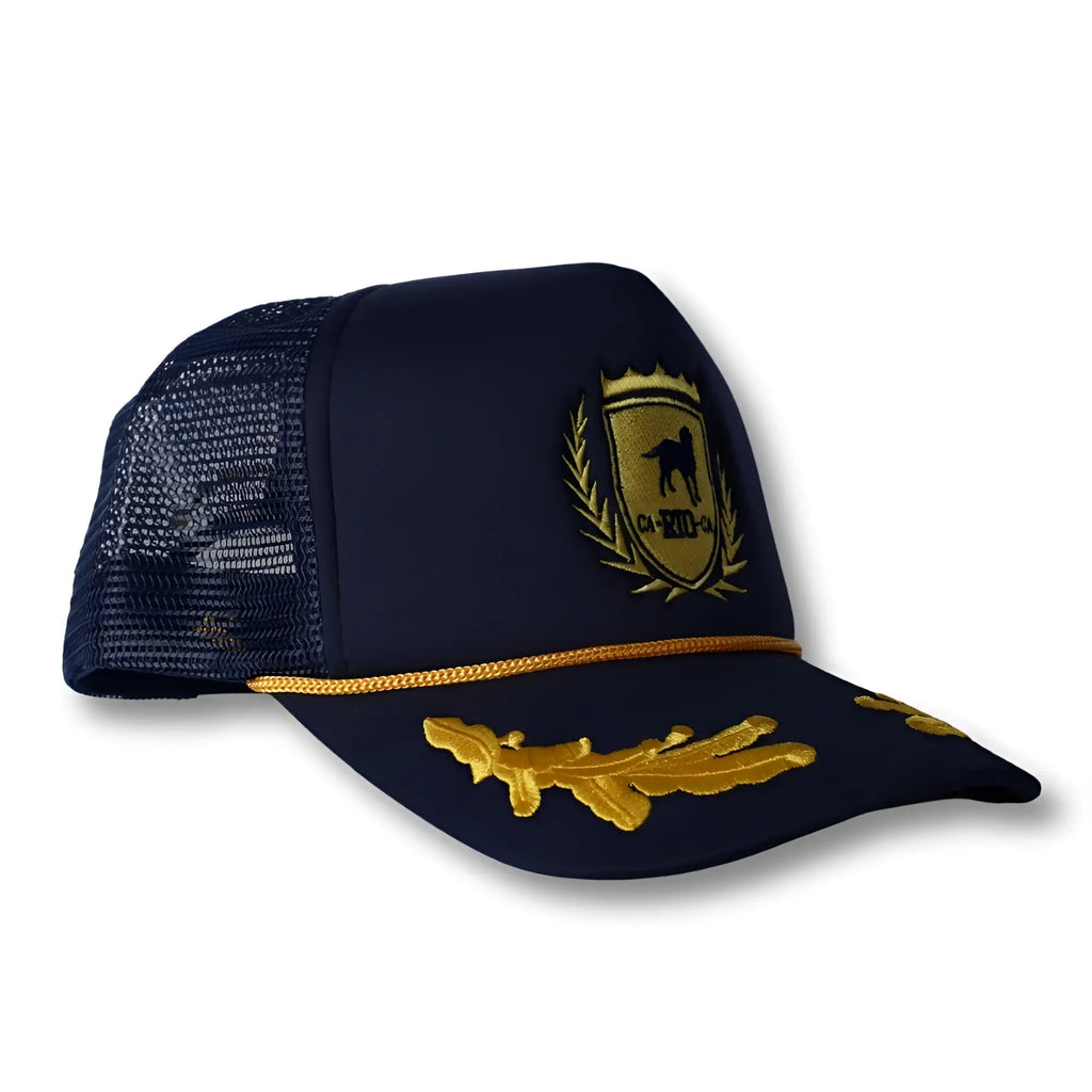Navy blue CA-RIO-CA captain trucker hat with gold embroidered crest and oak leaf insignia front view
