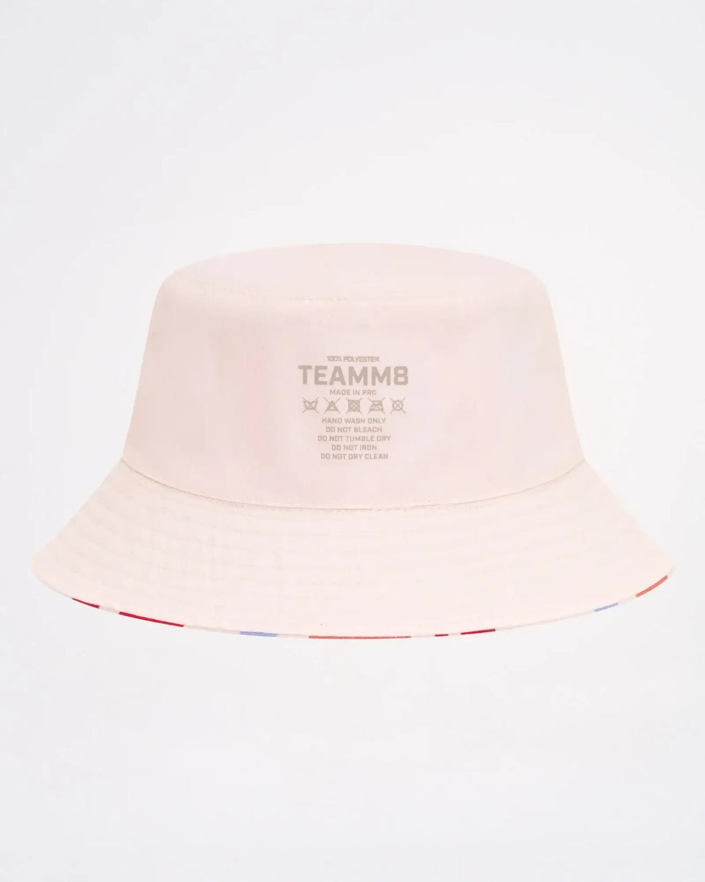 Cabana bucket hat in soft blush pink with subtle striped trim along the brim for stylish sun protection