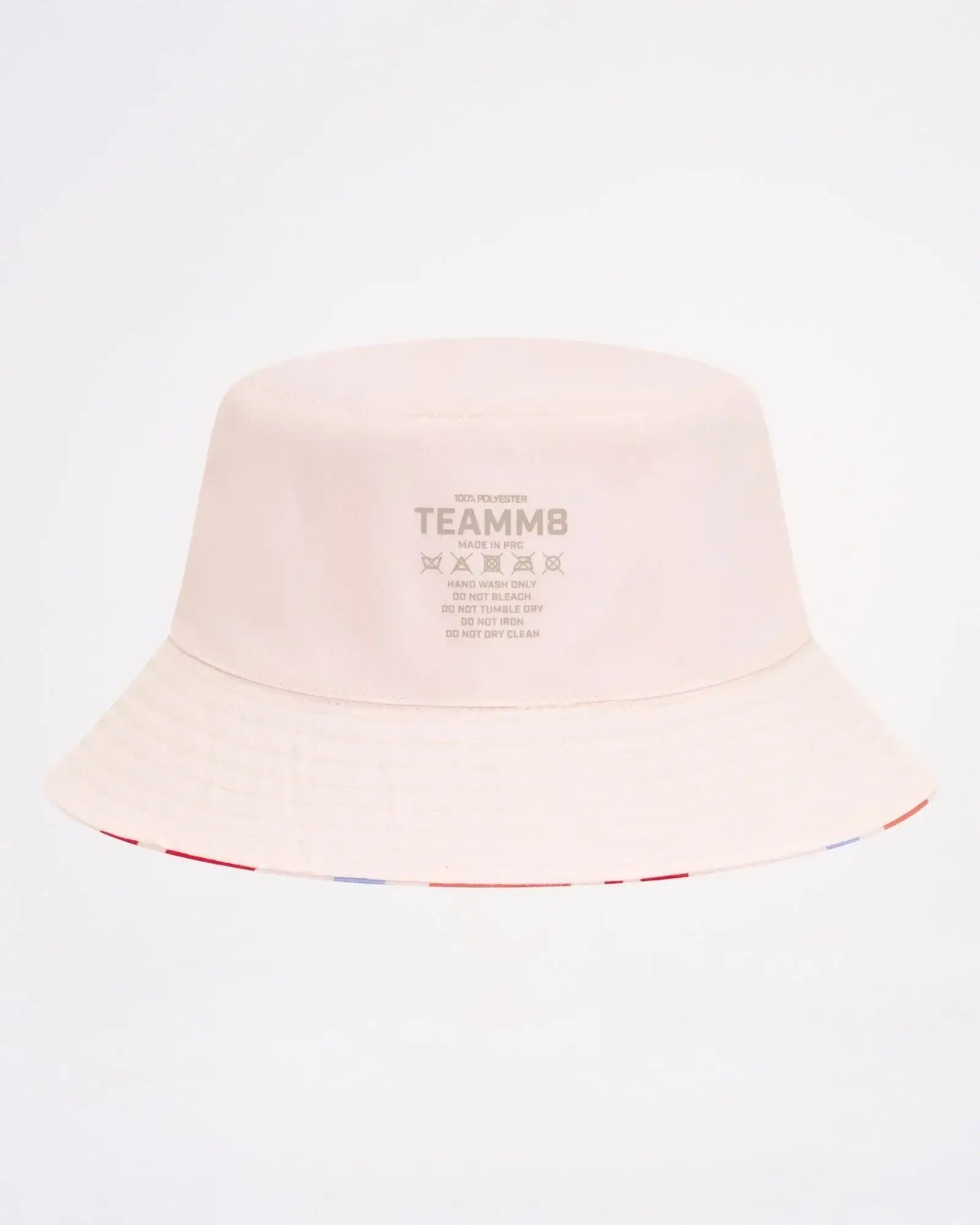 Cabana bucket hat in soft blush pink with subtle striped trim along the brim for stylish sun protection