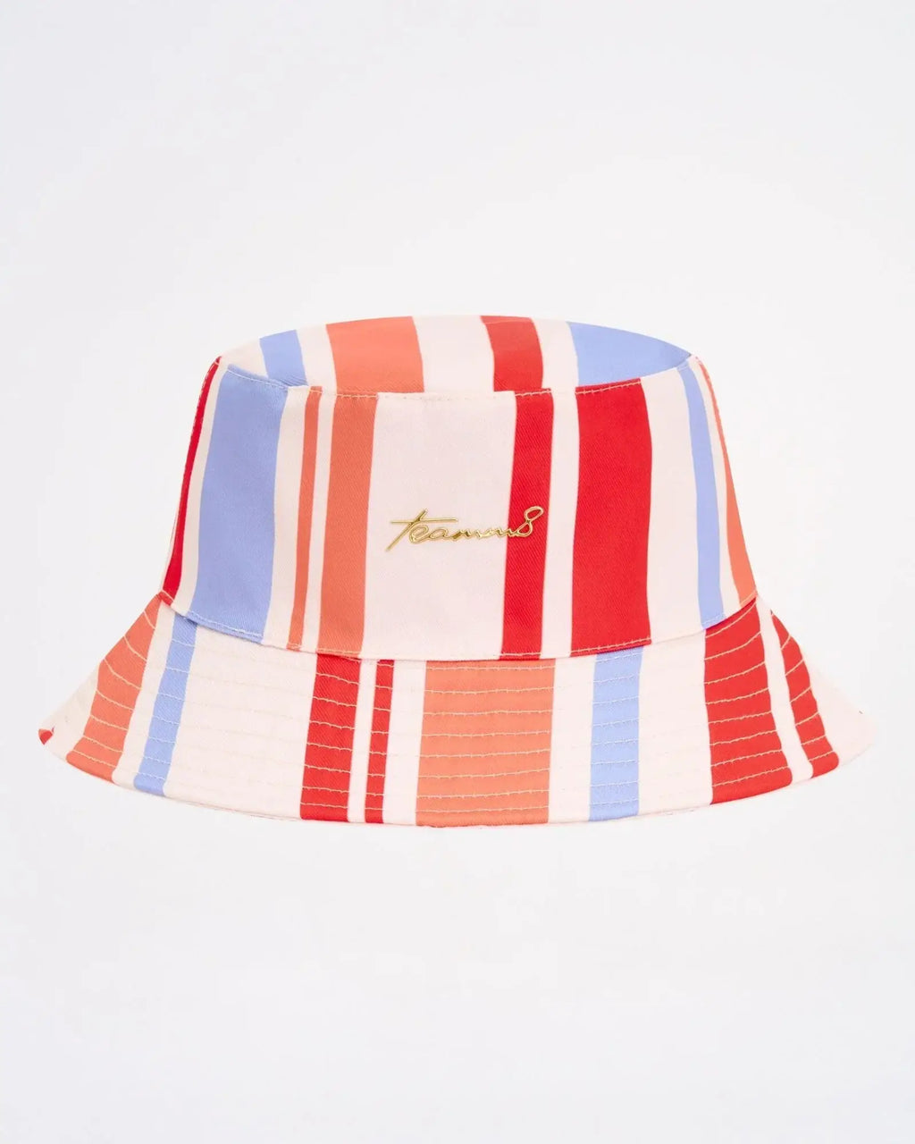 A vibrant cabana bucket hat with bold red blue cream vertical stripes and a subtle gold embroidered logo on front