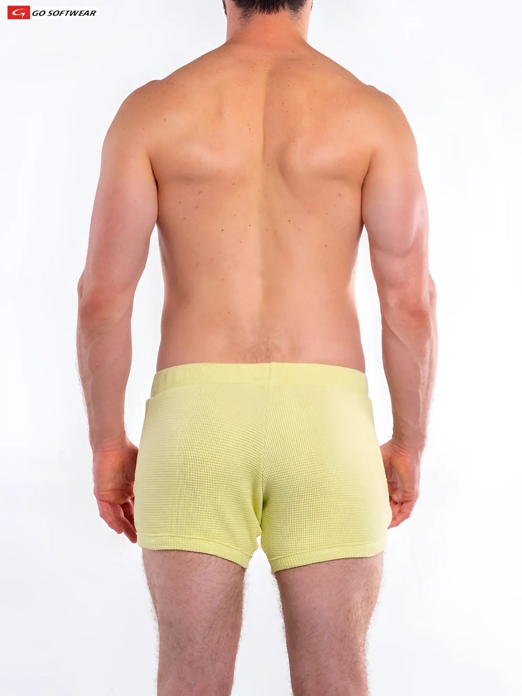 Light yellow waffle-knit men’s briefs from go softwear featuring a 10 inch short design with pockets