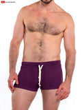 Purple textured so cal 8 inch lounge short swim trunks with white drawstrings for casual beachwear