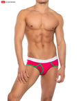 Bright pink Cal classic boy brief with white waistband green geometric trim featuring go softwear logo