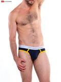Navy blue and yellow Cal contour pouch bikini briefs with white waistband featuring go softwear brand name