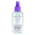 California Exotic Novelties Dr. Berman Anti-Bacterial Toy Cleaner in a clear spray bottle with a purple pump nozzle.