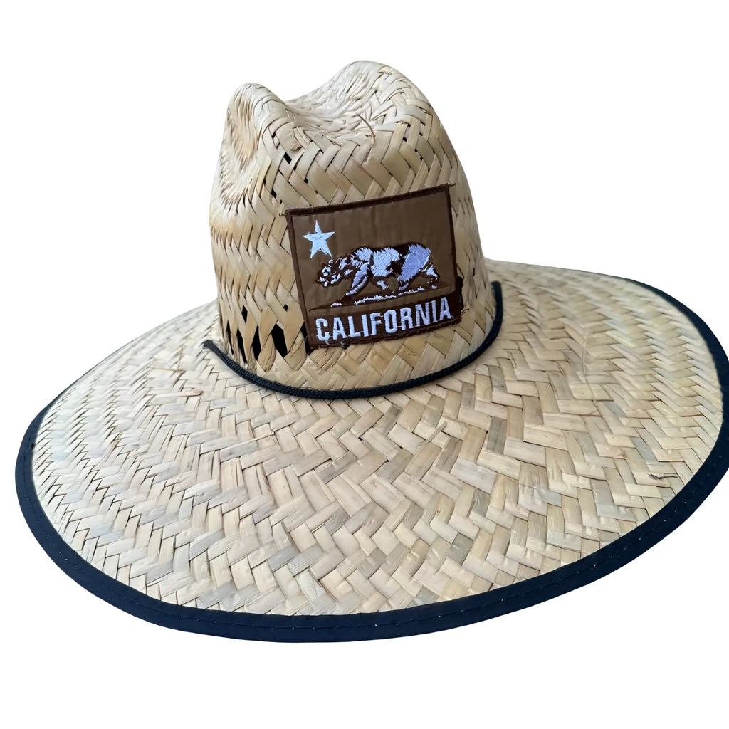 Beige woven straw California lifeguard hat with wide brim navy trim and brown patch embroidered with state flag design