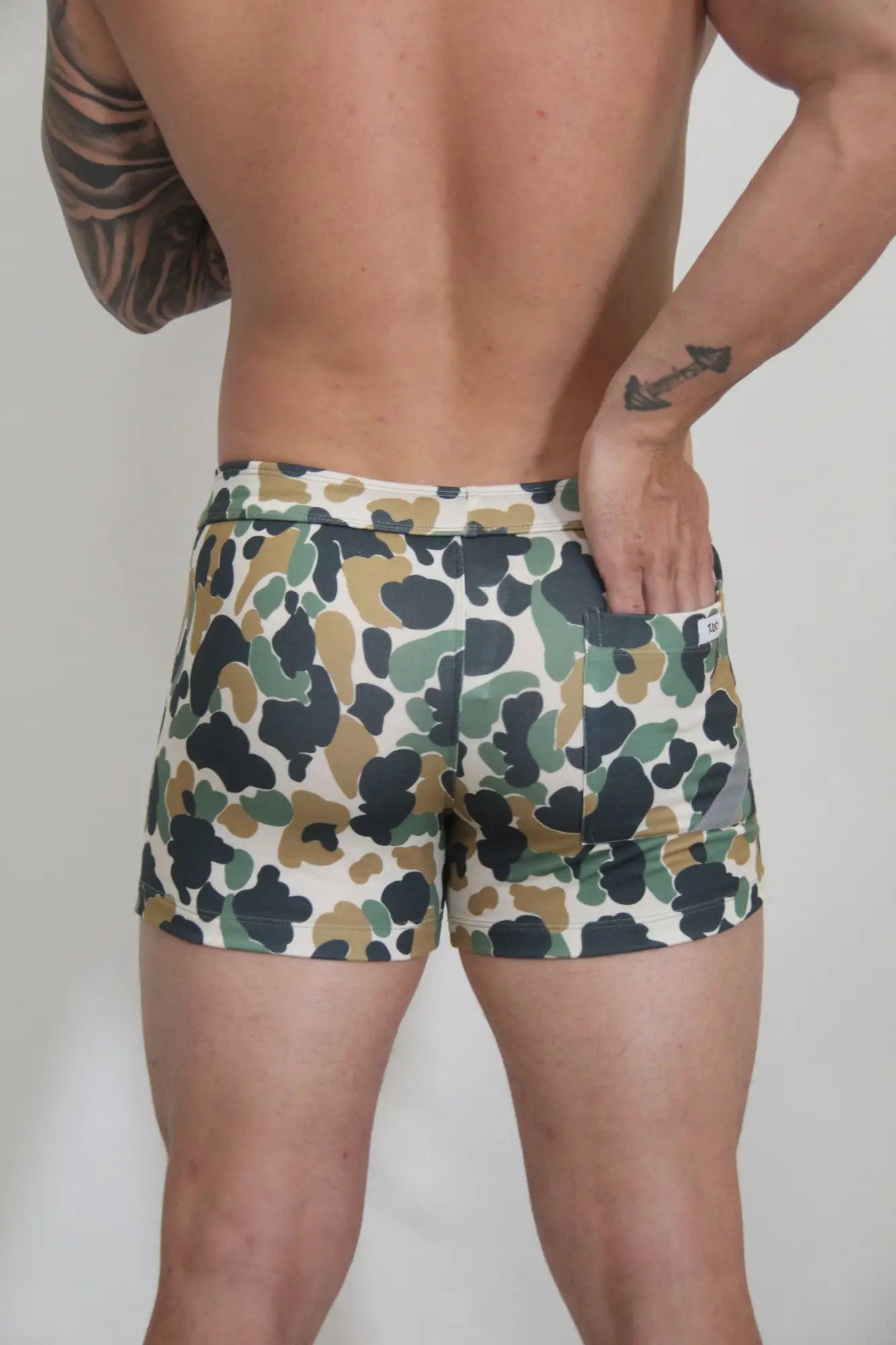 Camouflage fleece shorts in green brown and white tones made of soft fleece for comfortable casual wear