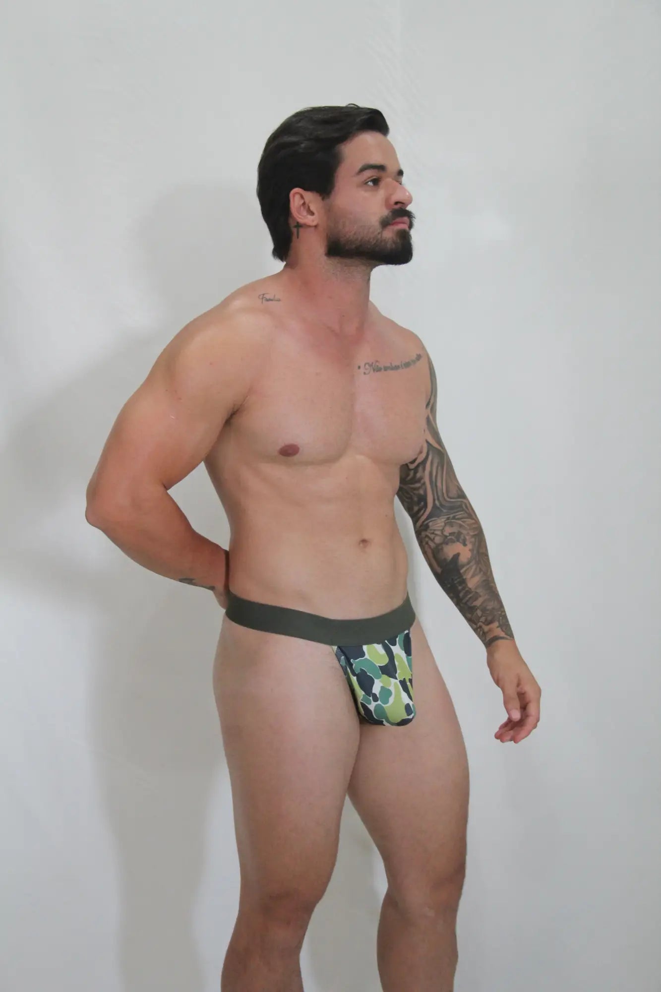 Green and white camouflage thong with a solid dark green waistband in soft breathable fabric