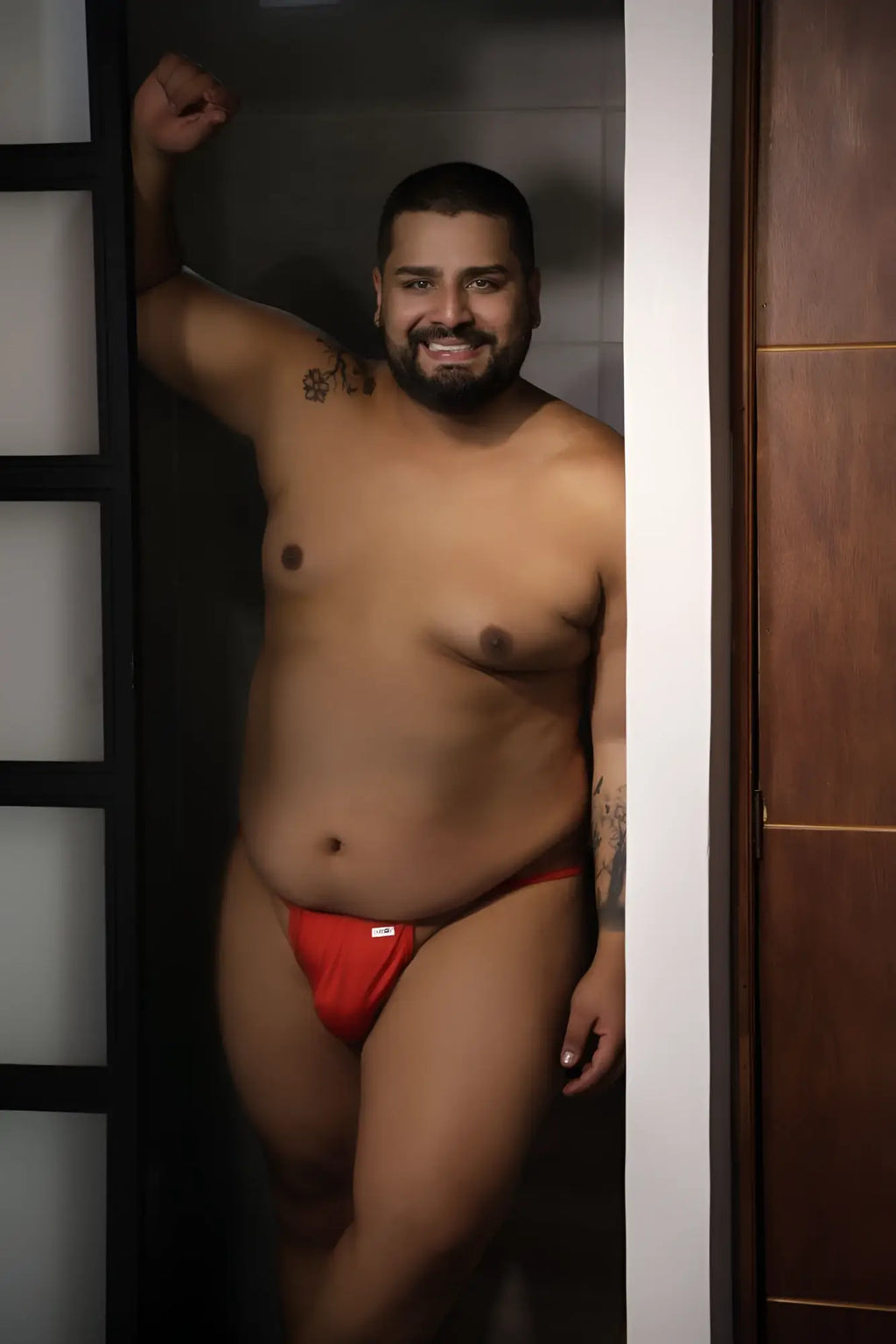 Red CandyMan 9586X thong briefs with a small white logo on the front designed for comfortable daily wear