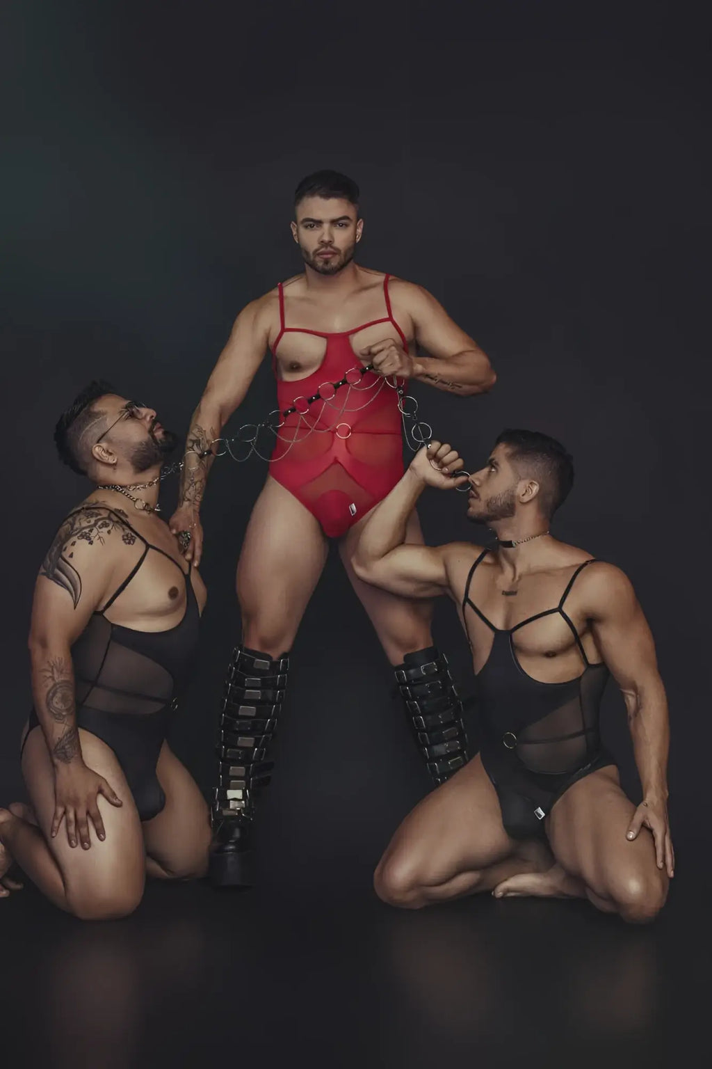 Red CandyMan 99670X harness bodysuit with thin straps and chest cutout in black for edgy fashion looks