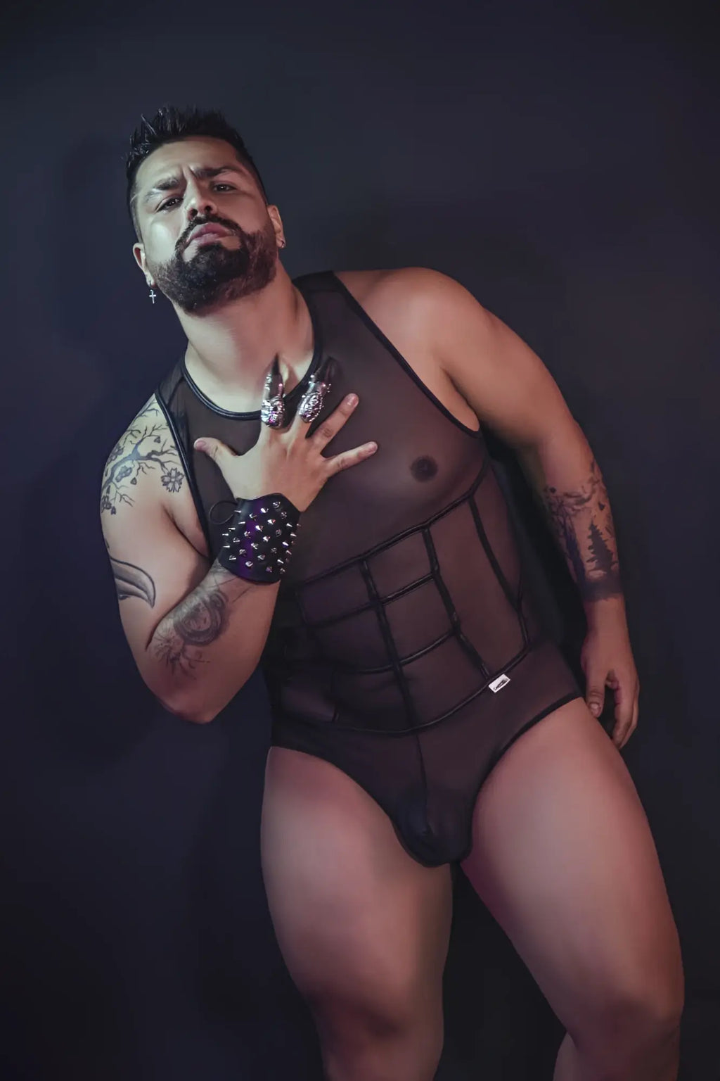 Black candyMan 99683X tulle bodysuit featuring sheer mesh, structured corset design, and reinforced seams