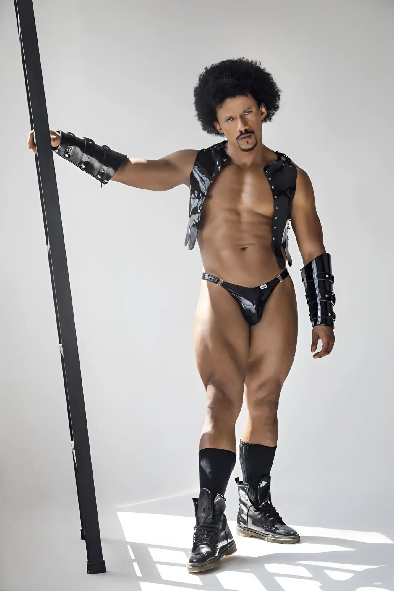 Black leather vest with silver studs and matching black armored arm guards from candyman 99819 dom thongs color gloss black