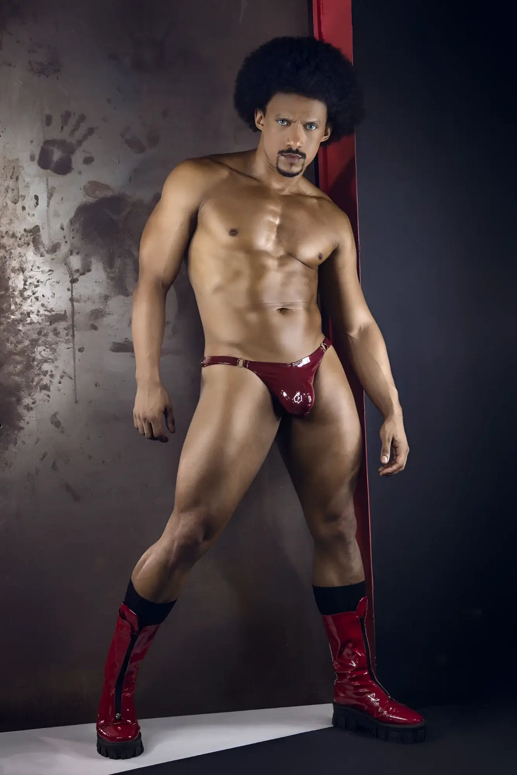 Shiny red latex thong with metallic buckle candyMan 99819 Dom Thongs gloss wine color front view