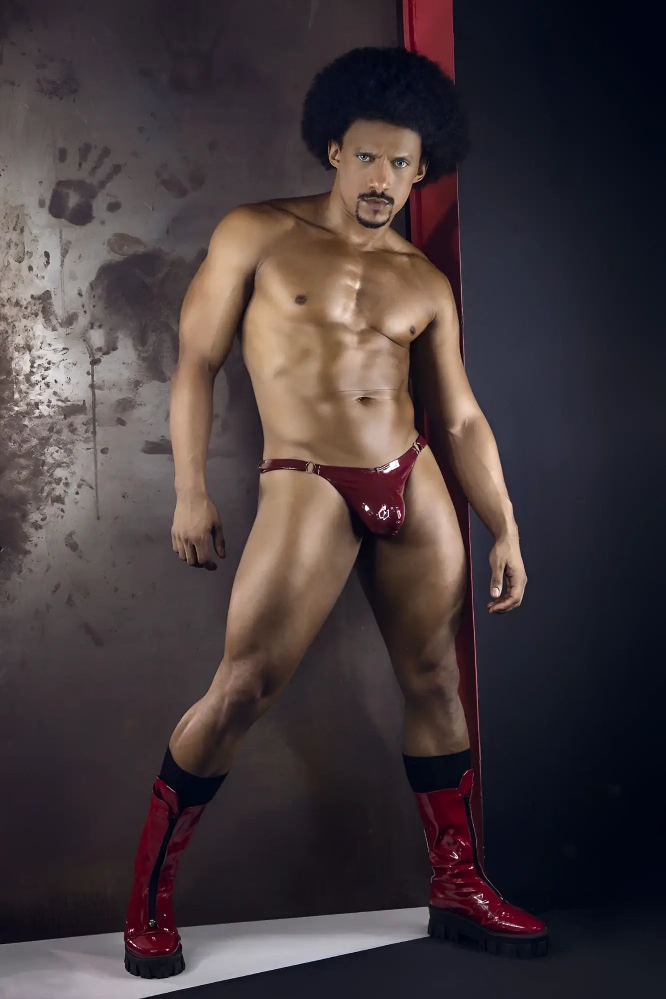 Shiny red latex thong with metallic buckle candyMan 99819 Dom Thongs gloss wine color front view