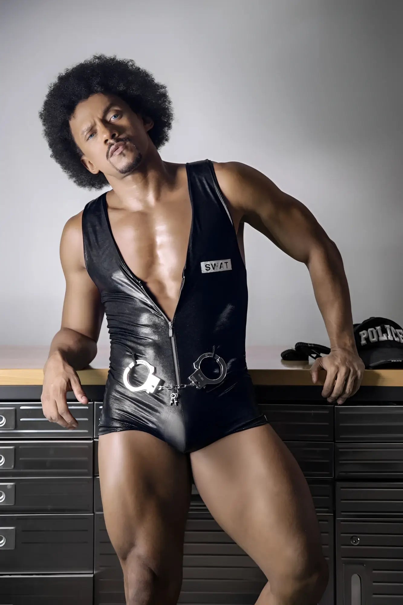Black shiny vinyl swat bodysuit with silver handcuffs at the waist candyMan 99844 police bodysuit color black