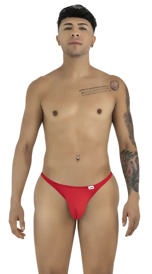 Red thong from candyman 99930 with a small white brand tag on the waistband made of soft fabric