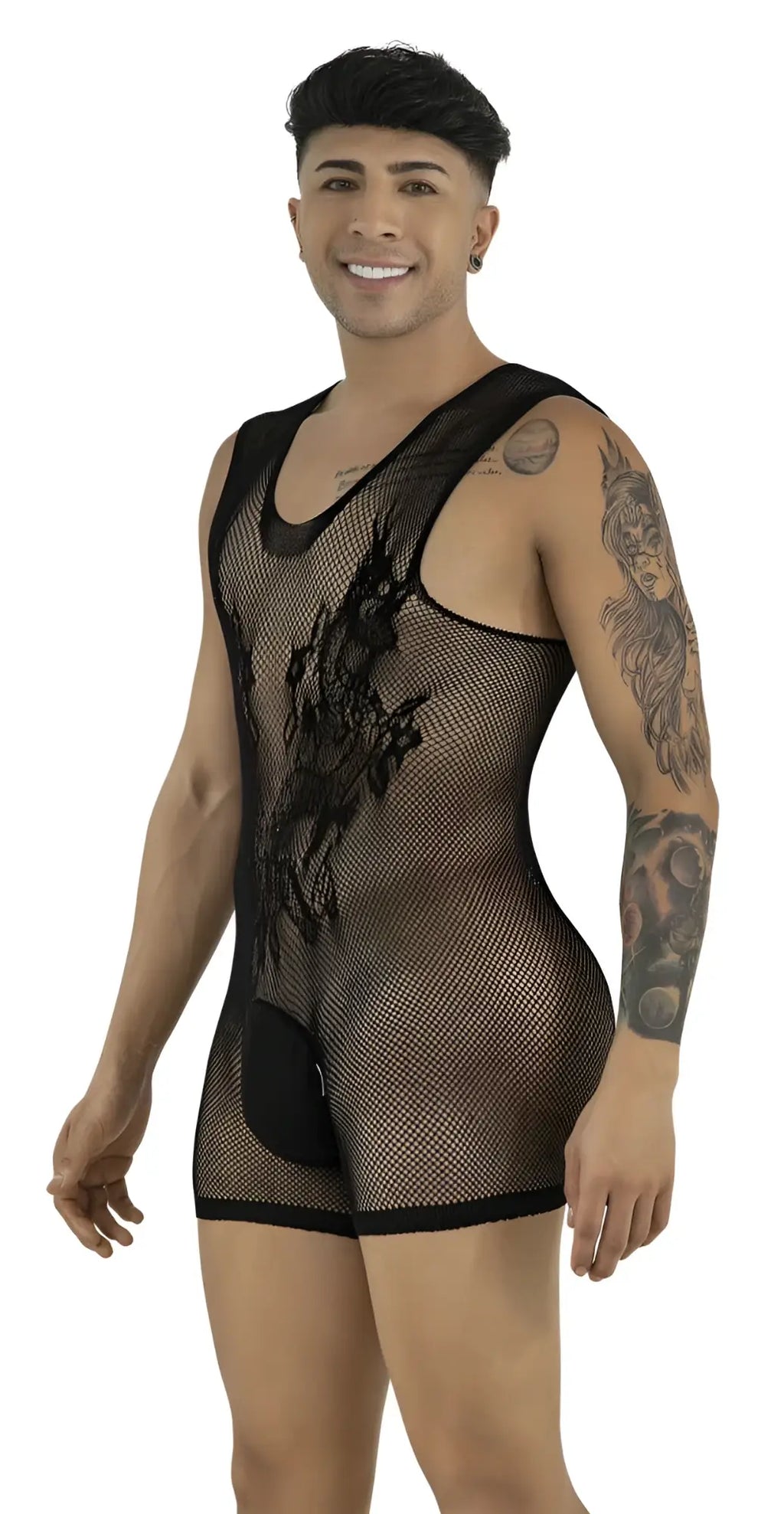 A smiling man wears a black, sleeveless mesh bodysuit with a solid pouch, standing against a white background.