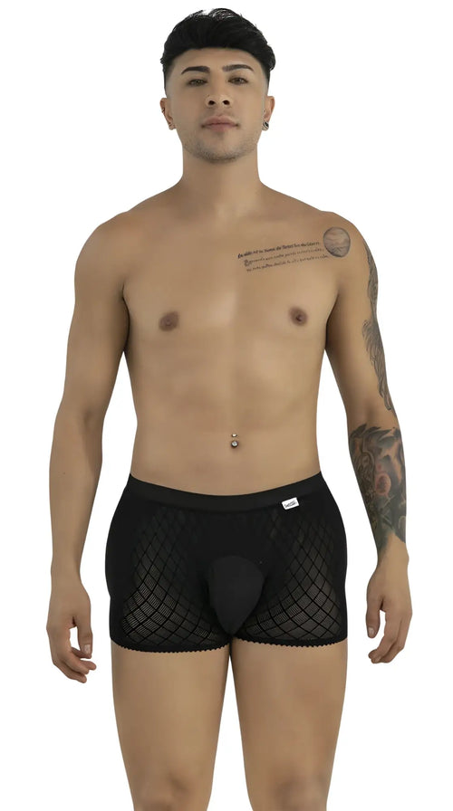 Model wearing black CandyMan mesh boxer briefs with a solid pouch, standing against a white background.