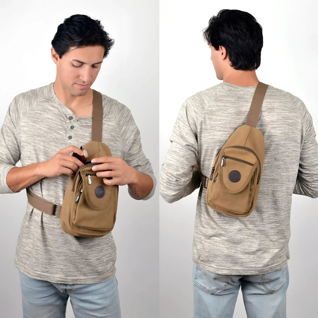 Tan canvas sling bag with brown strap and multiple zippered compartments for organized carrying
