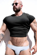 Light blue athletic briefs with smooth form-fitting design shown with black cap sleeve rib knit crop top