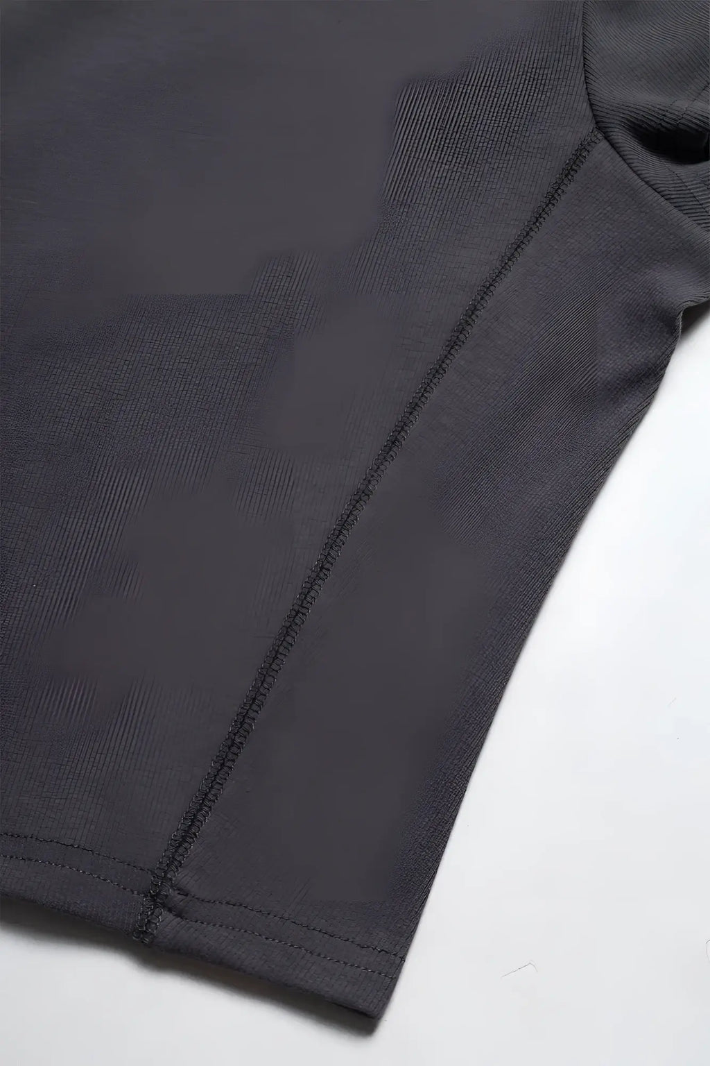 Cap sleeve rib knit crop top in storm grey featuring dark gray soft-textured cotton with subtle seam detailing