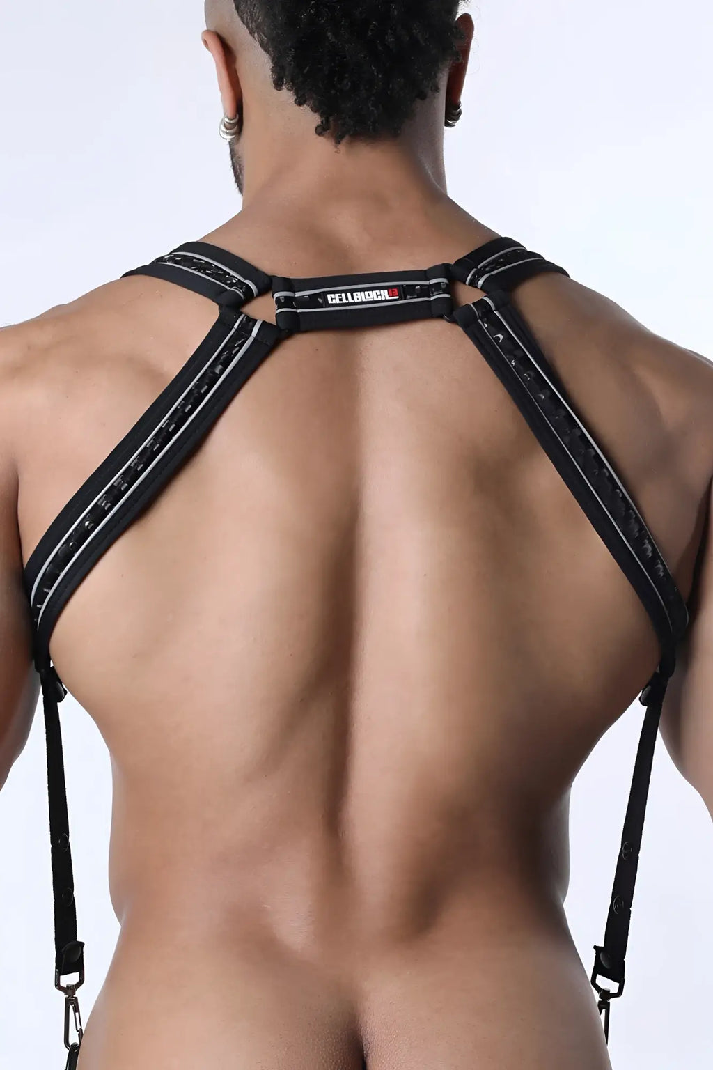 Carbon shadow body harness black lace trim suspenders with silver stitching and cellbio label on the back side