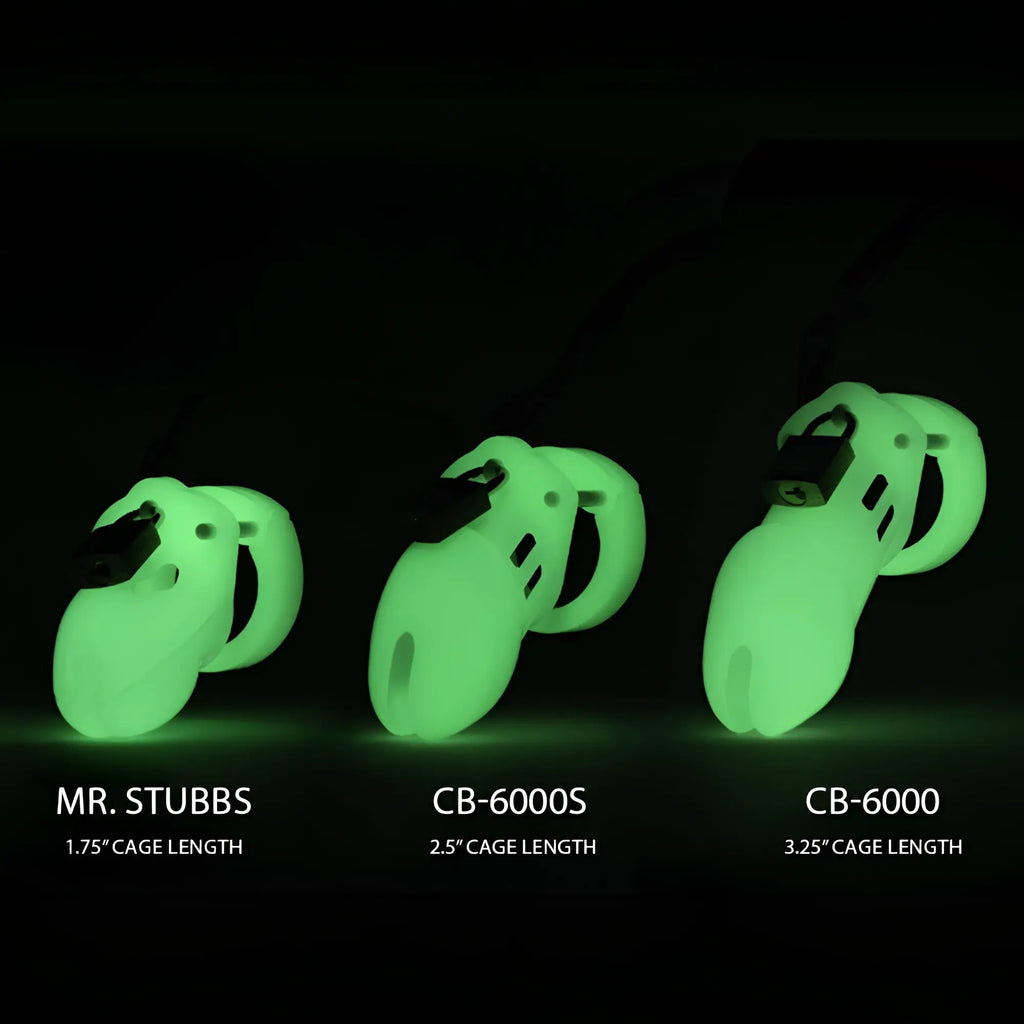 CB-X CB-6000 glow-in-the-dark chastity kits in three sizes, featuring cage, ring, and lock against a black background.