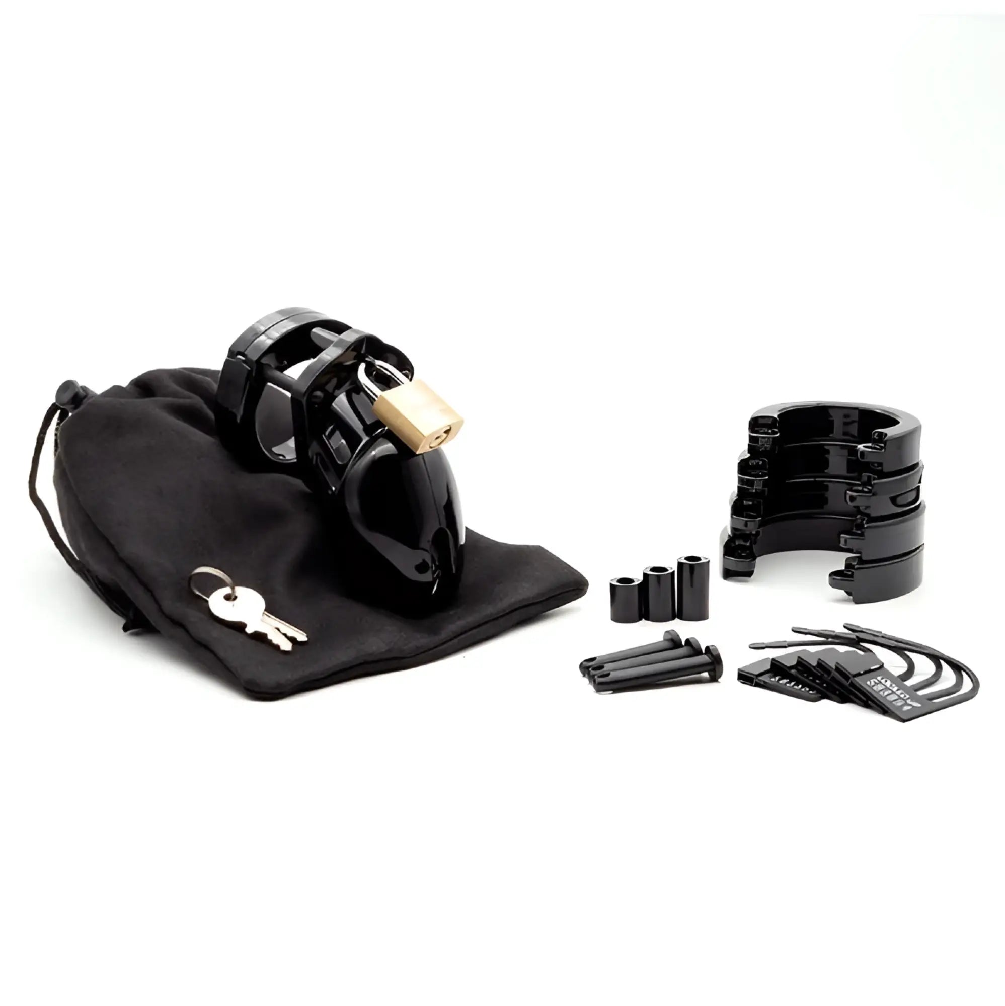 CB-X CB6000S black chastity cage kit featuring a caged device, brass padlock, keys, base rings, and security seals.