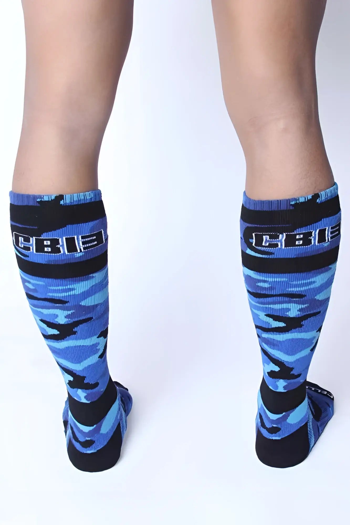 Blue and black camouflage knee-high socks with cbi branding on the cuff by cellblock 13 foxhole size one size
