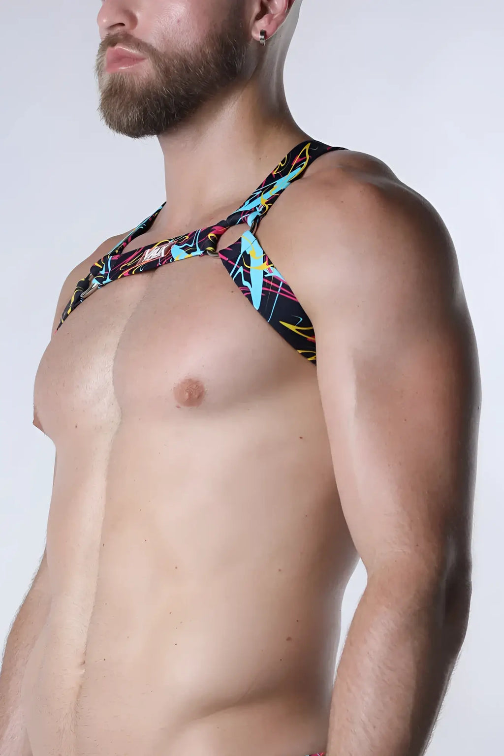 Pulse elastic harness vibrant neon lightning bolt patterned black halter top with bold colorful abstract design