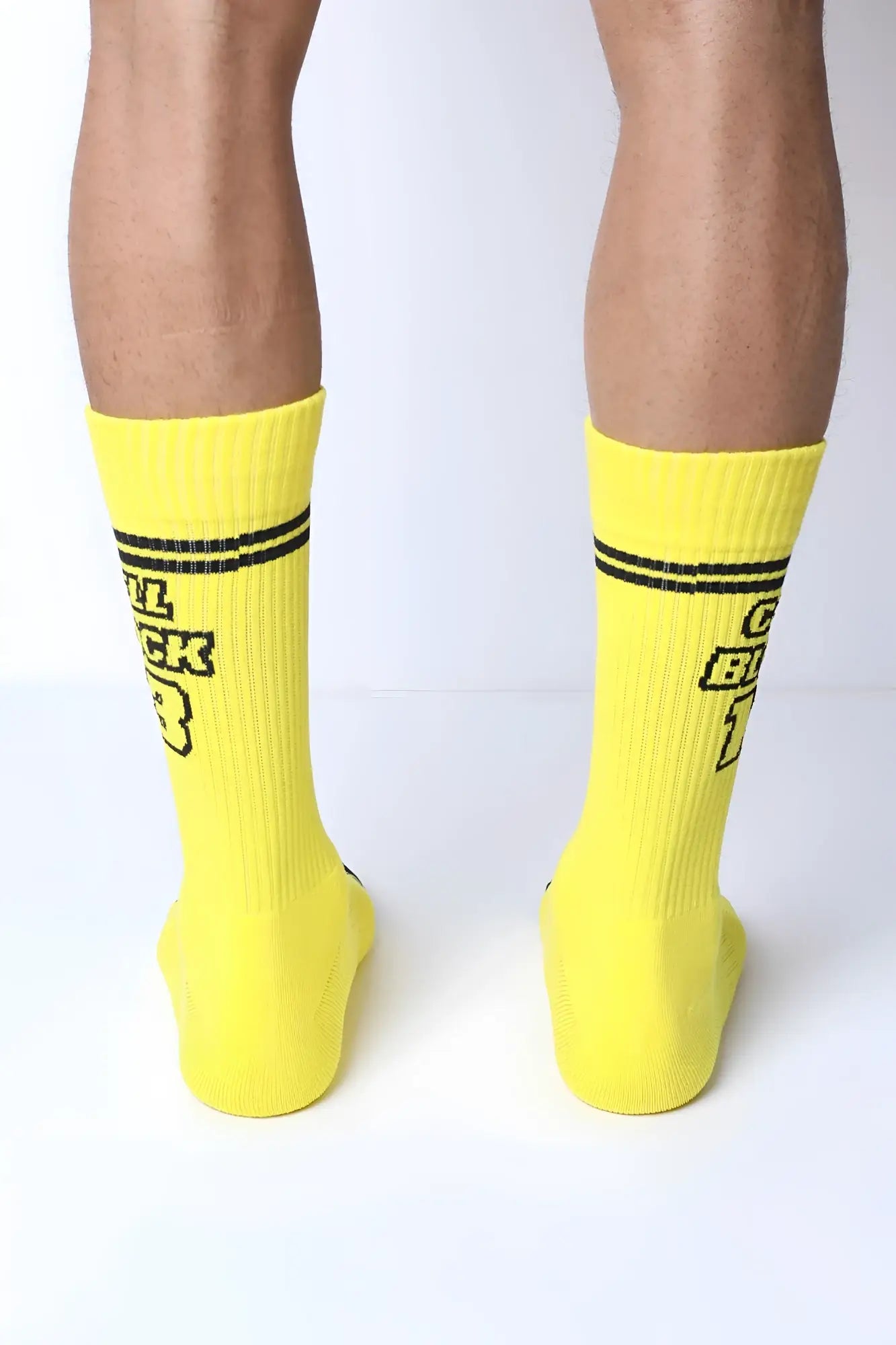 Bright yellow starter crew socks with black text and two horizontal stripes near the top for everyday wear