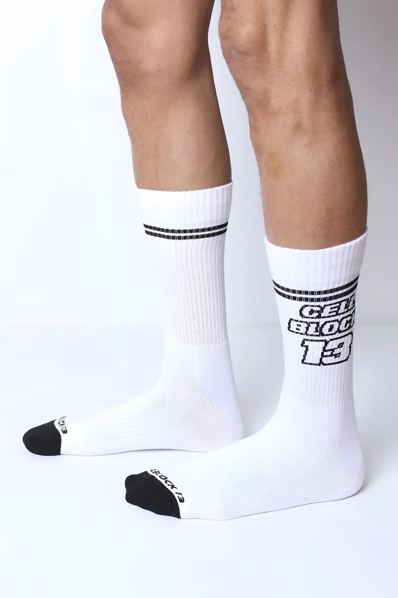 Starter crew socks white athletic socks with black toe caps two stripes and bold cell block 13 graphic