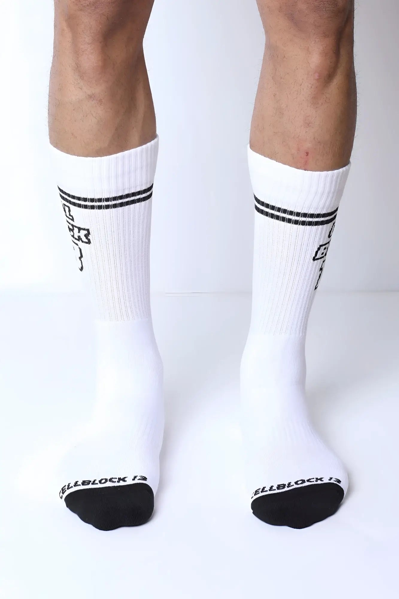 Starter crew socks white cotton with black toe caps and two stripes featuring subtle logo on each leg