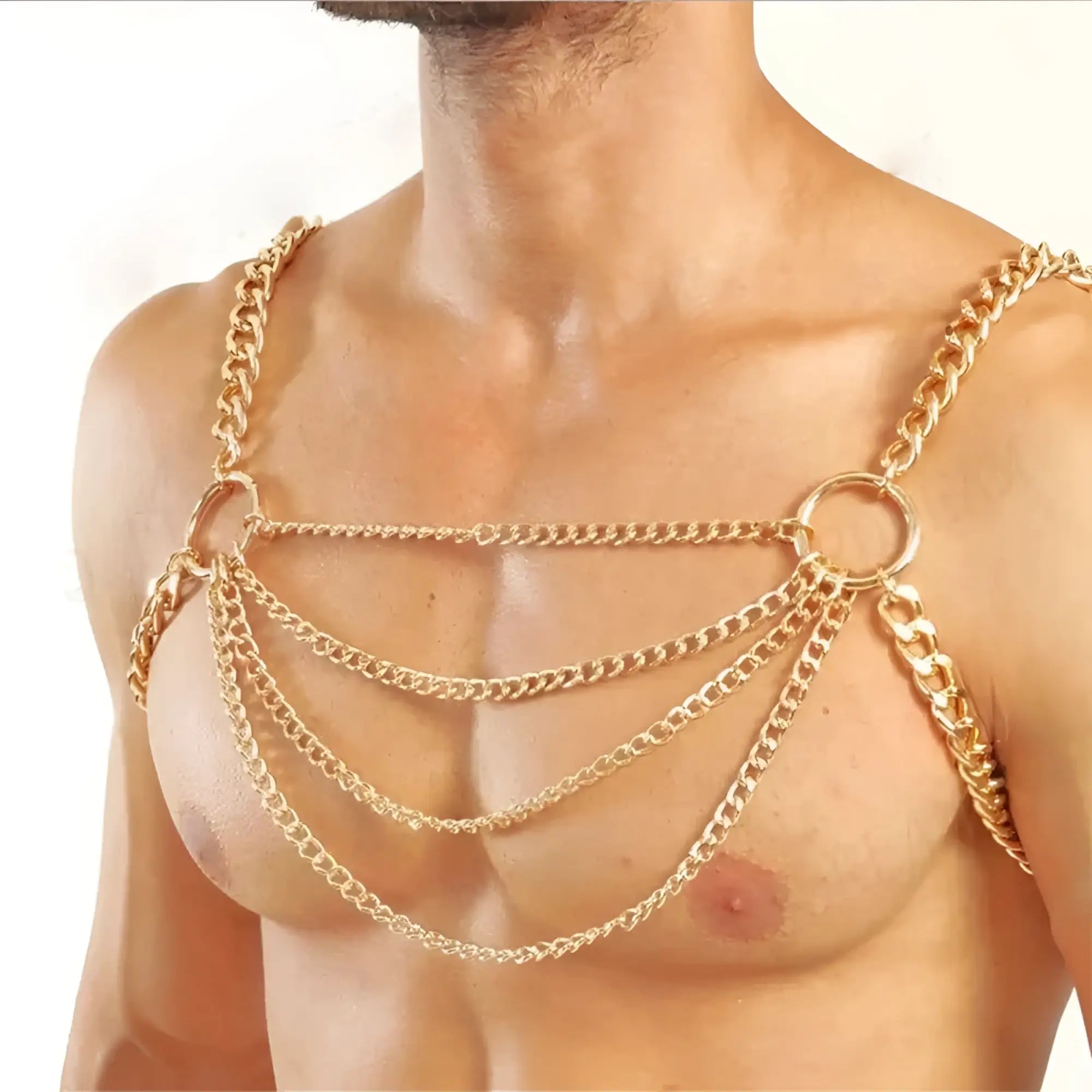 Gold-colored chain harness with thick layered chains and circular rings for stylish body accessory
