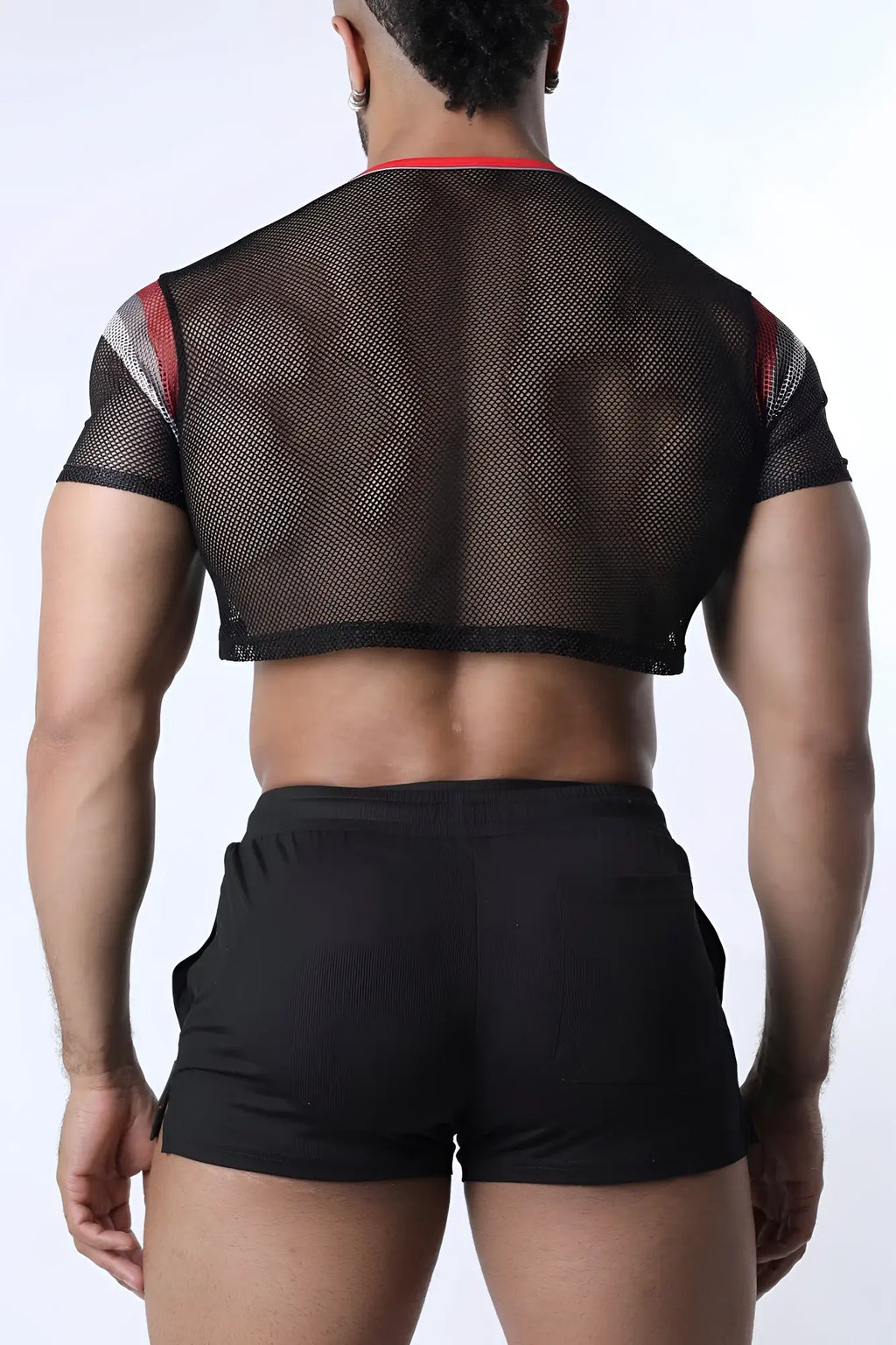 Black mesh Chain Reaction crop top with red and gray striped shoulder accents for a stylish athletic look