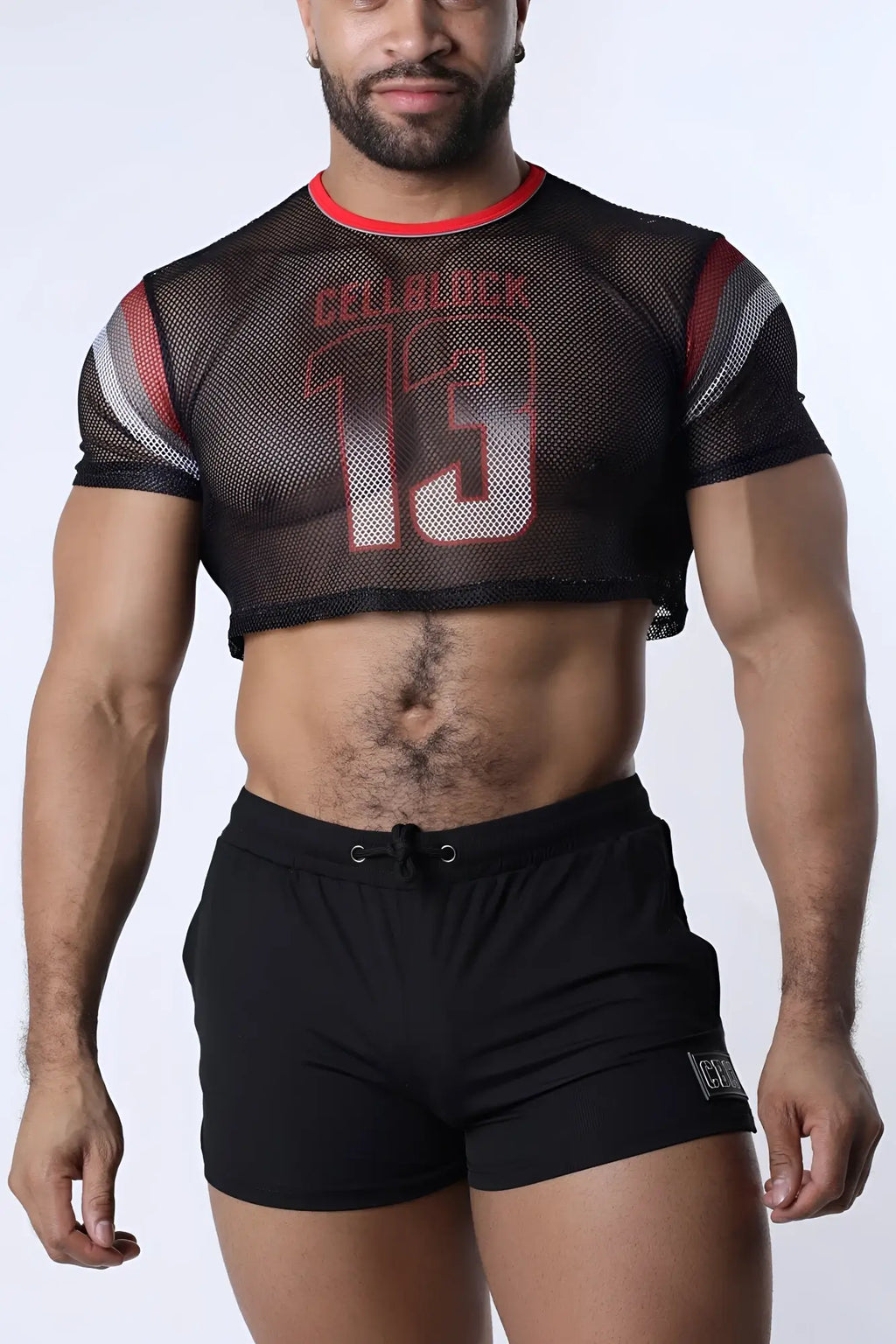 Black mesh crop top featuring red and white collback 15 graphic from chain reaction collection shown from back side