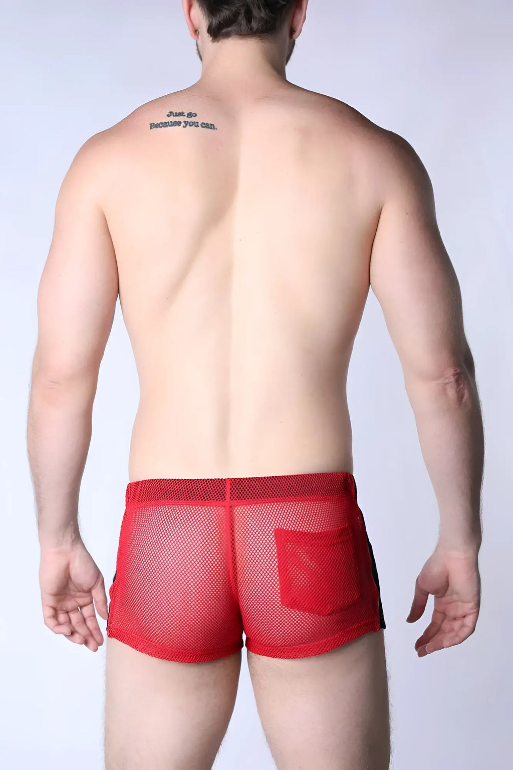 Red mesh briefs with black side panel and front pocket from chain reaction mesh short collection